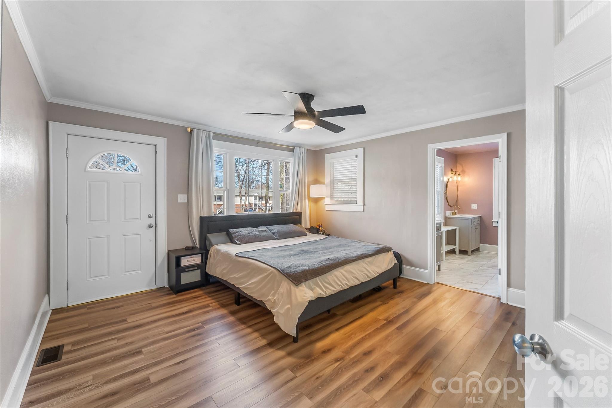 1072 5th Street Northeast Hickory, NC 28601 - Photo 11 of 33 a bedroom with a bed and a table in it