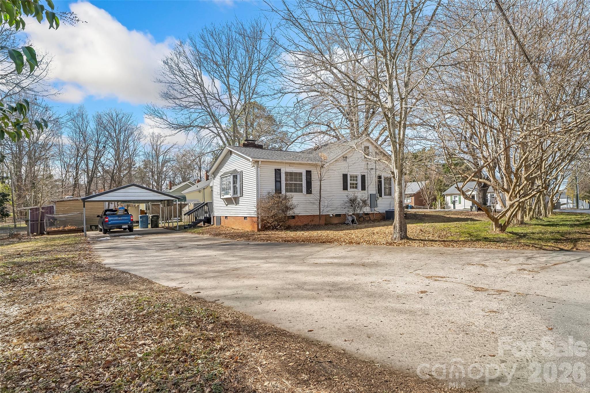 1072 5th Street Northeast Hickory, NC 28601 - Photo 19 of 33 a house that has a tree in front of it