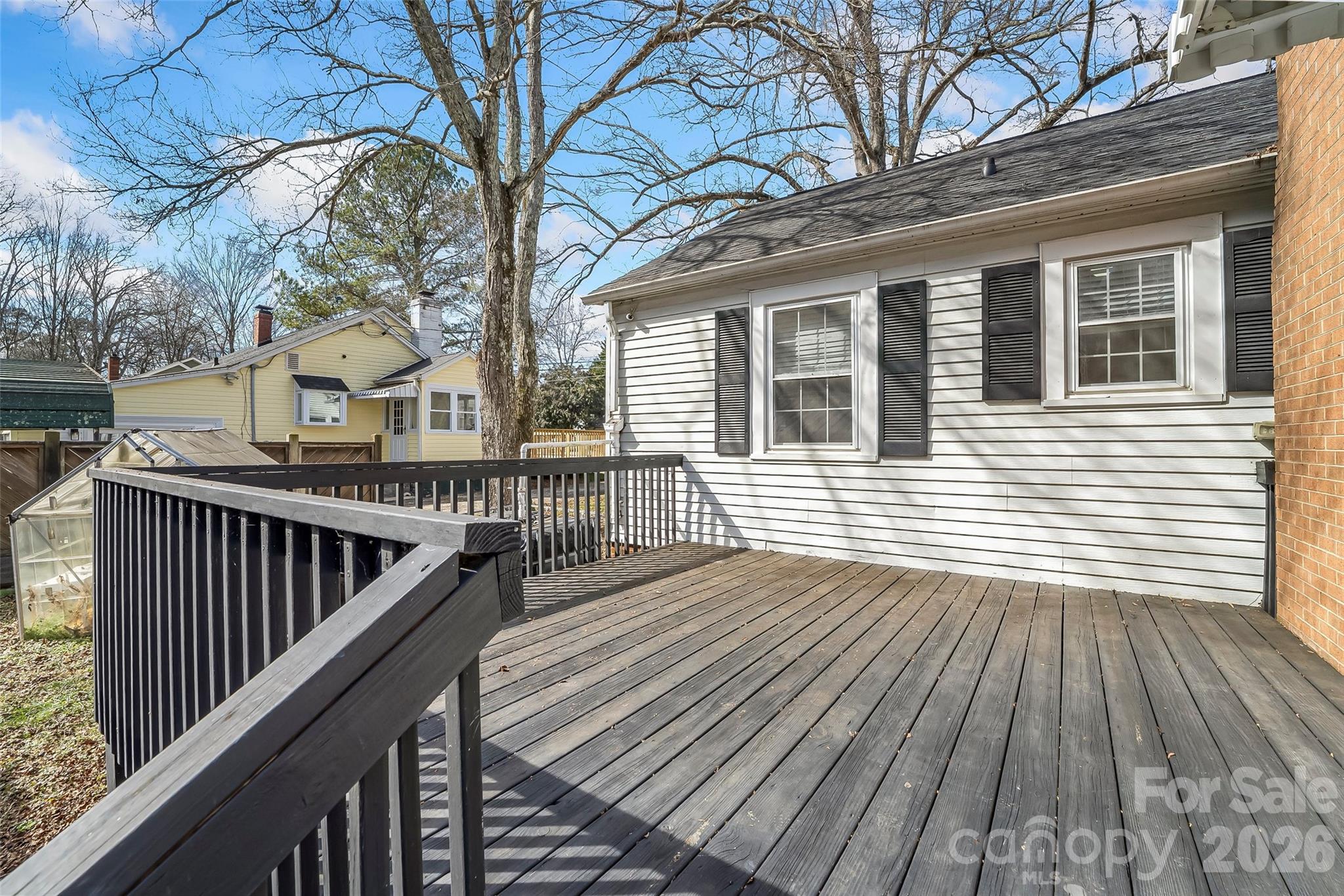 1072 5th Street Northeast Hickory, NC 28601 - Photo 24 of 33 a view of a house with wooden deck