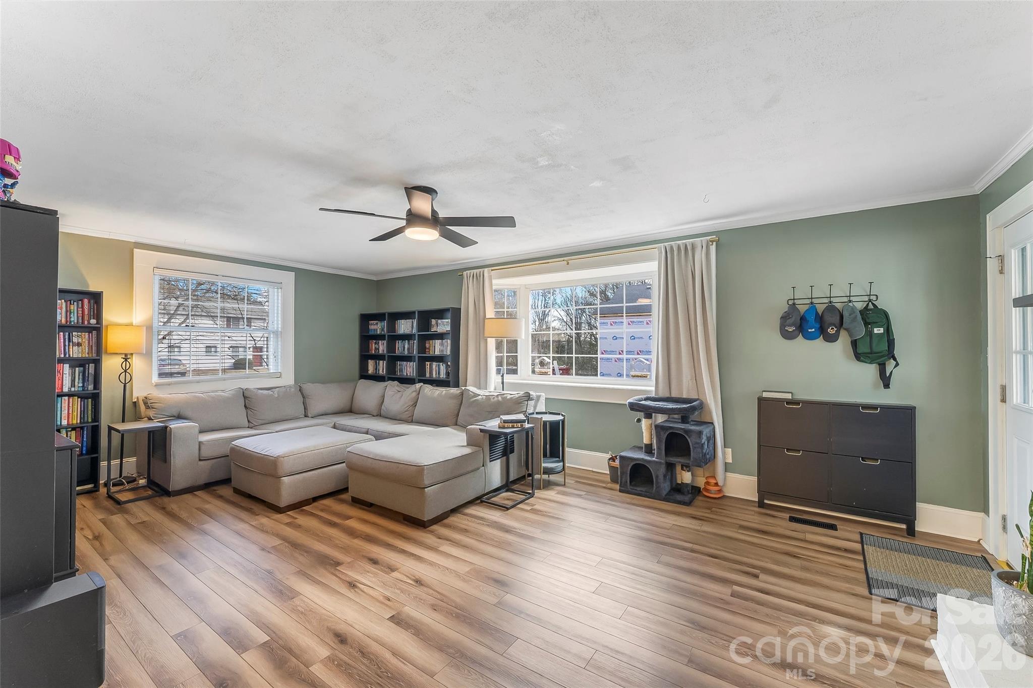 1072 5th Street Northeast Hickory, NC 28601 - Photo 6 of 33 a living room with furniture and a wooden floor