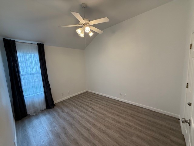 1121 Wigwam Leander, TX 78641 - Photo 14 of 18 an empty room with wooden floor and window
