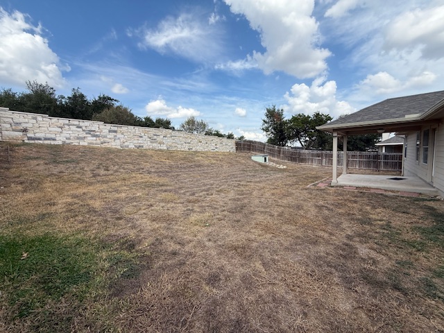 1121 Wigwam Leander, TX 78641 - Photo 16 of 18 a view of a house with a backyard