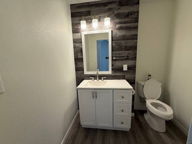 1121 Wigwam Leander, TX 78641 - Photo 3 of 18 a view of bathroom with a toilet sink and mirror