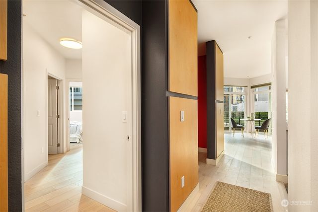 a view of a hallway with windows