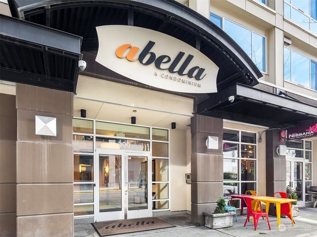 a view of a street with stores