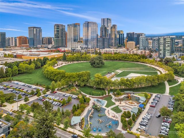 a view of a city with tall buildings
