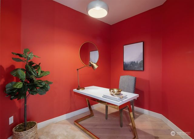 a room with furniture potted plant and a lamp