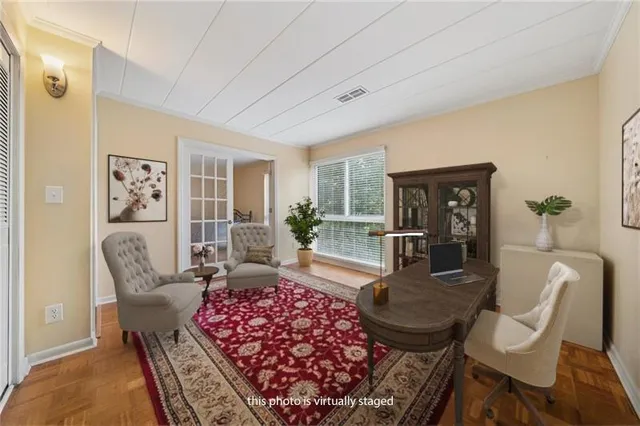 a living room with rug