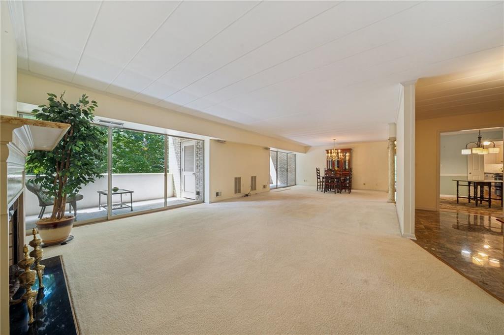 53 Highland Road, Unit 403404 Bethel Park, PA 15102 - Photo 7 of 33 a living room with furniture and a large window