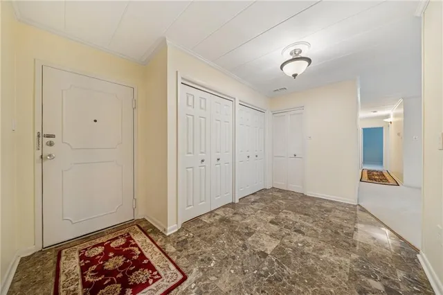 a view of room with window and hardwood floor
