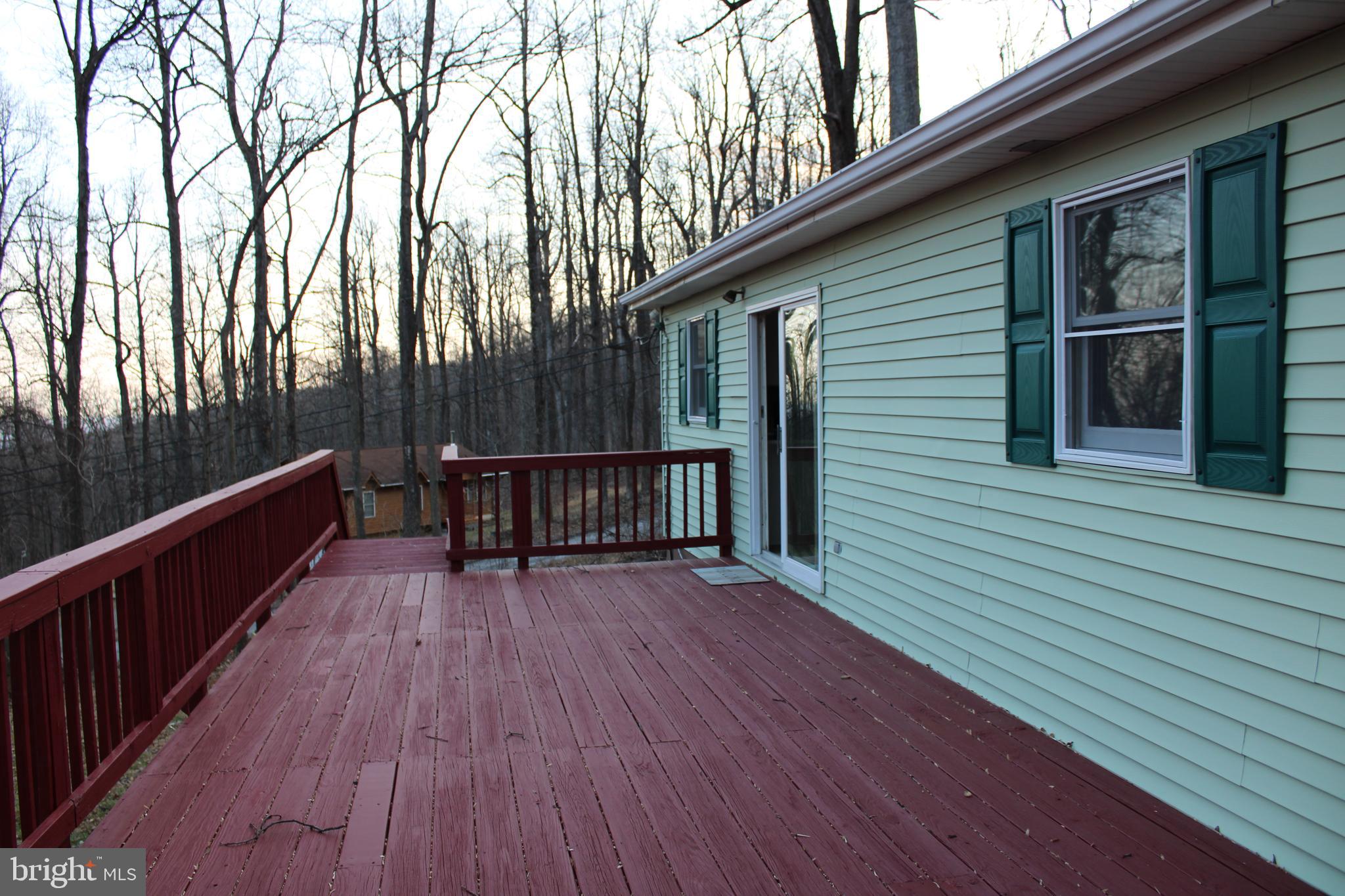 28 Henry Way Linden, VA 22642 - Photo 13 of 85 a view of balcony with wooden floor and fence
