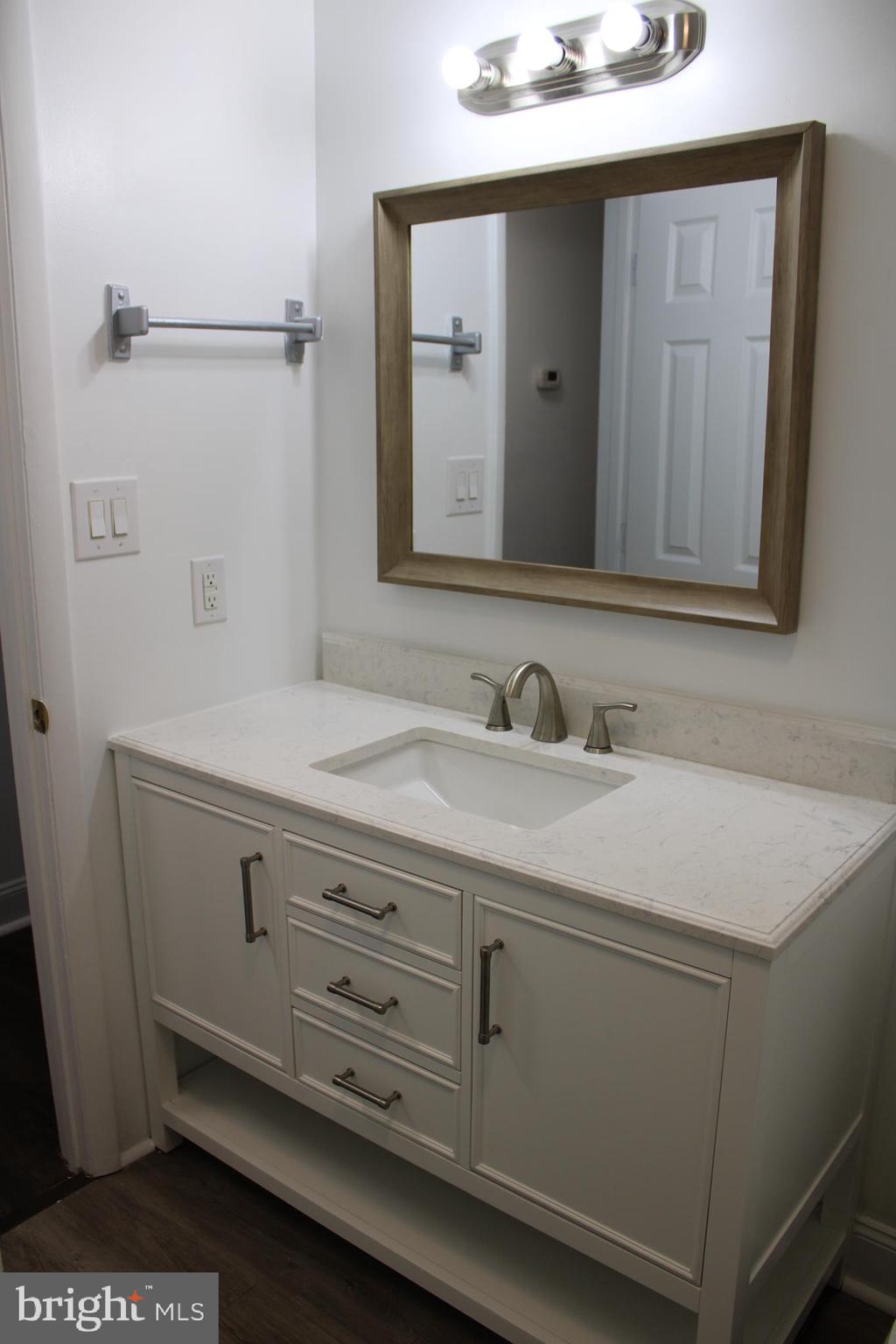 28 Henry Way Linden, VA 22642 - Photo 30 of 85 a bathroom with a sink and a mirror