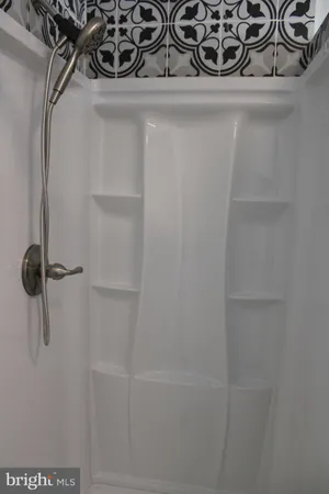 a bathroom with a sink and a stove