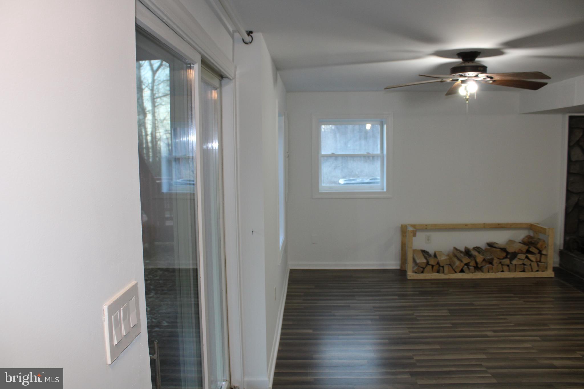 28 Henry Way Linden, VA 22642 - Photo 57 of 85 a view of a room with wooden floor and staircase