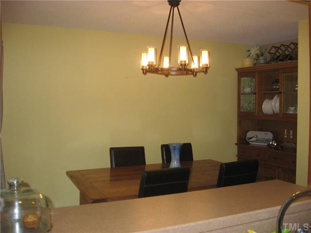 3116 Hope Valley Road Durham, NC 27707 - Photo 11 of 24 The kitchen cut-out window allows a view of the dining area. Easy to pass through! Dining Room