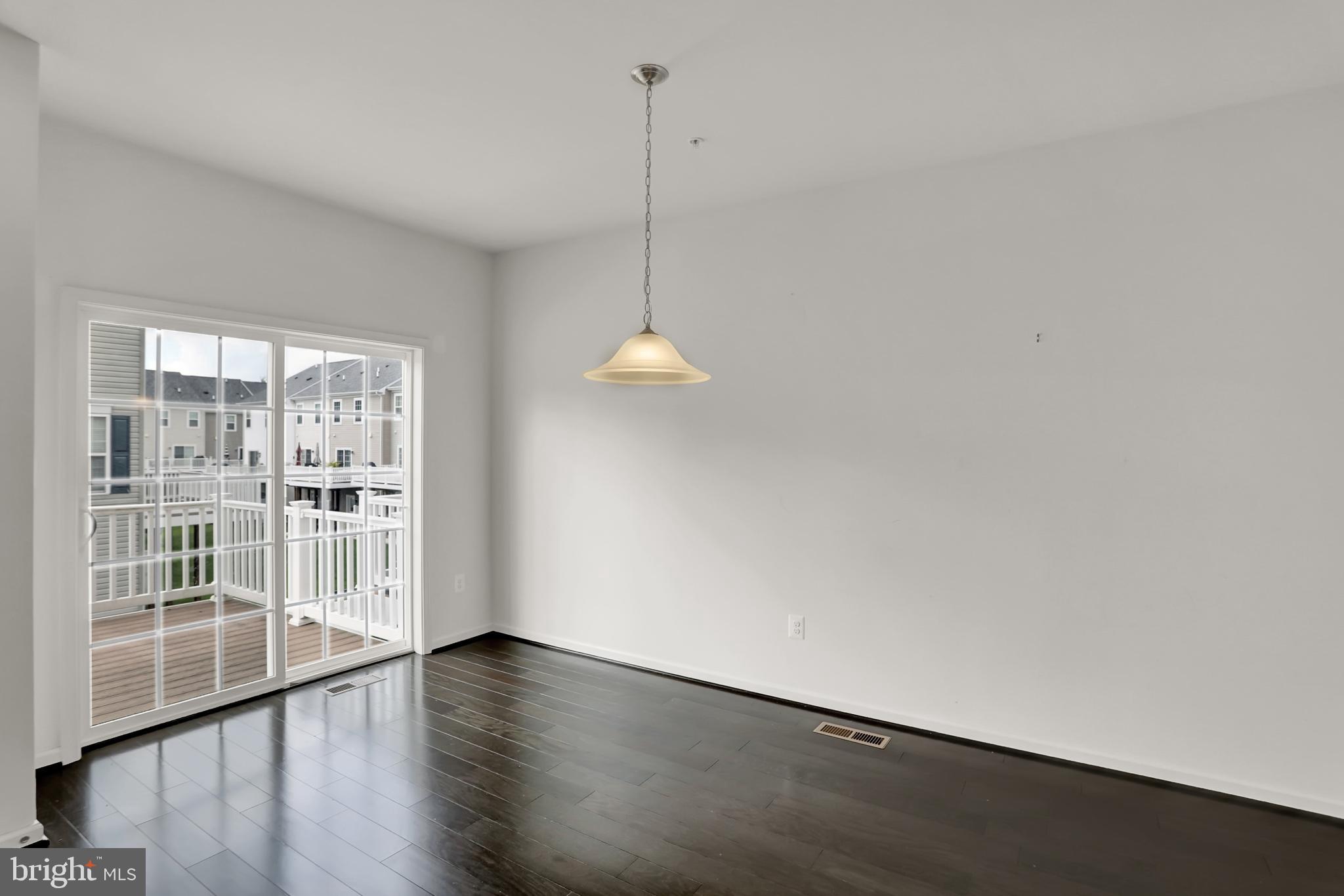 931 Ramble Run Road Baltimore, MD 21220 - Photo 12 of 40 Dining Room leads to Deck