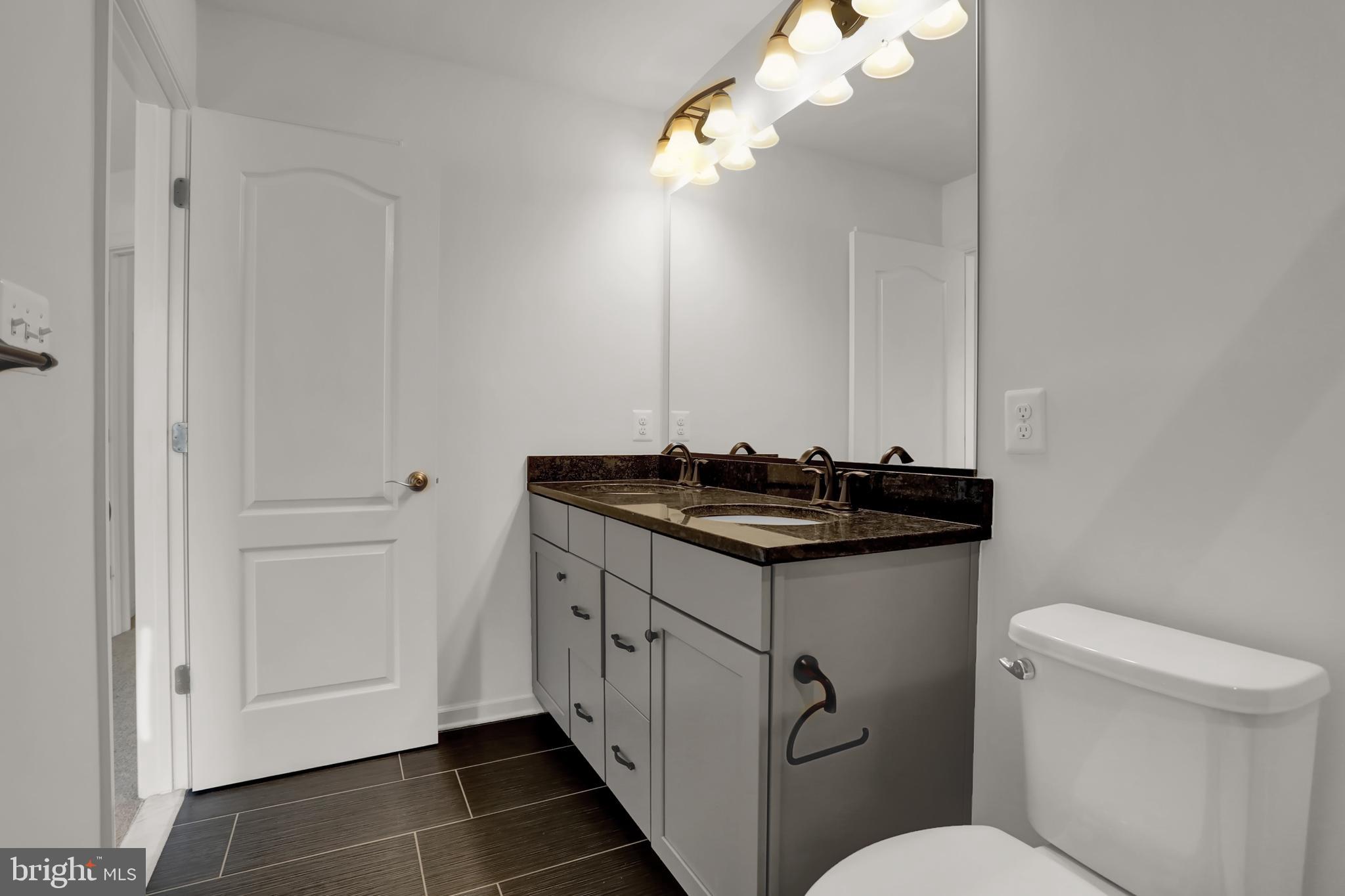 931 Ramble Run Road Baltimore, MD 21220 - Photo 18 of 40 Primary Bathroom with double vanity