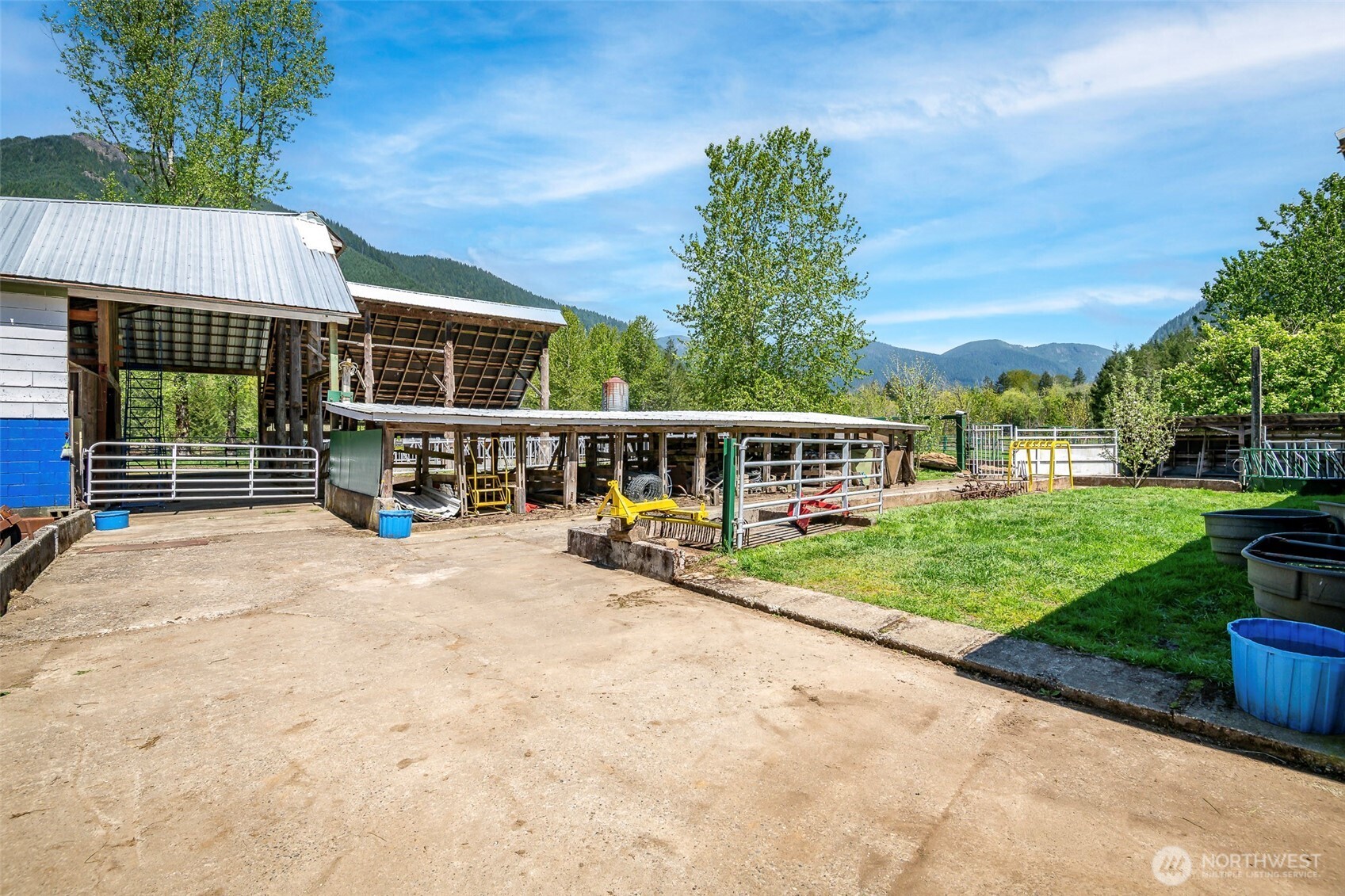296 Dodge Road Morton, WA 98356 - Photo 16 of 24 a view of house with outdoor space and swimming pool