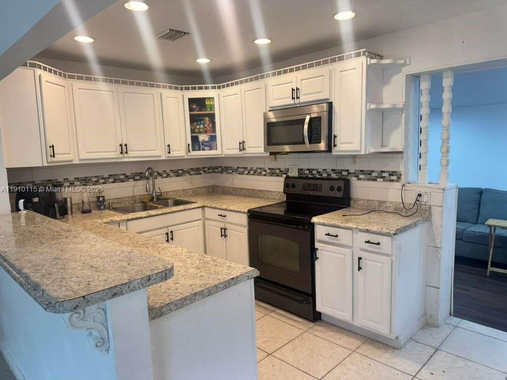 1517 Northwest 58th Avenue Margate, FL 33063 - Photo 1 of 25 KITCHEN