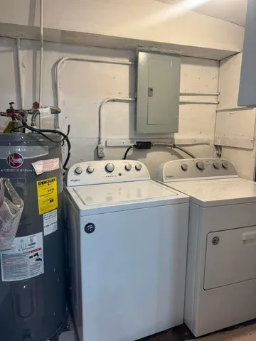 a utility room with dryer and washer