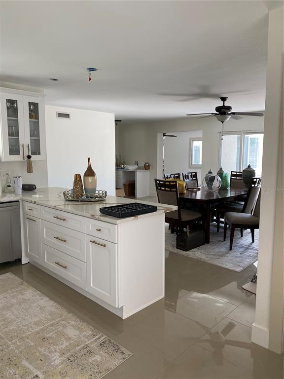7230 Shepherd Street Sarasota, FL 34243 - Photo 11 of 38 a living room with furniture and view of kitchen