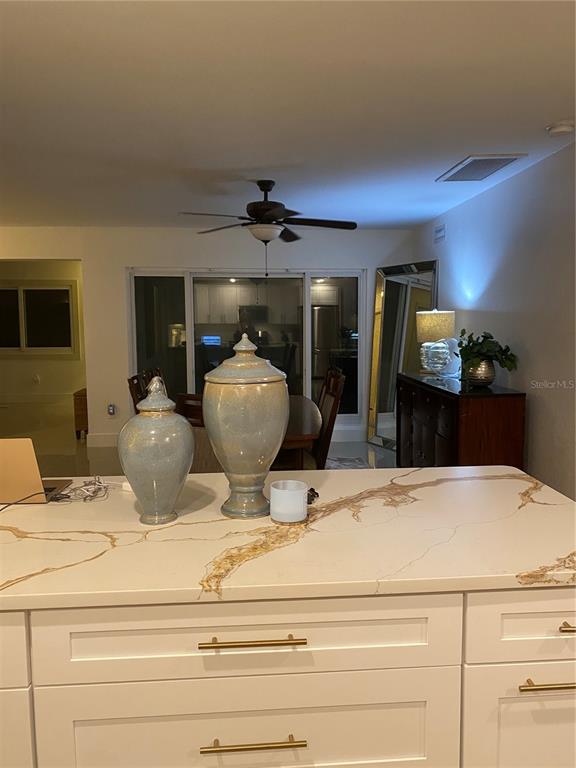 7230 Shepherd Street Sarasota, FL 34243 - Photo 12 of 38 a view of living room with furniture and lamp