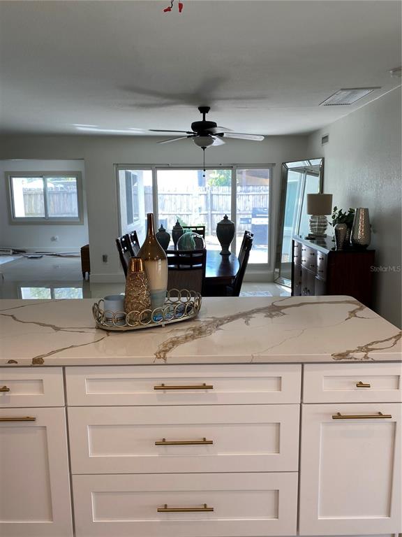 7230 Shepherd Street Sarasota, FL 34243 - Photo 13 of 38 a view of a counter top the center island in the living room