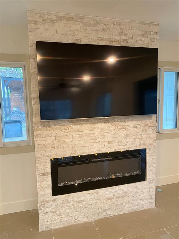 7230 Shepherd Street Sarasota, FL 34243 - Photo 15 of 38 a bathroom with a sink and a microwave