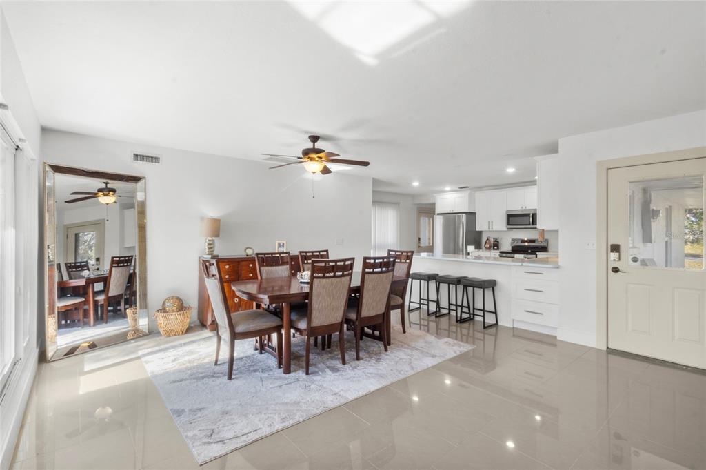 7230 Shepherd Street Sarasota, FL 34243 - Photo 25 of 30 a view of a dining area with furniture