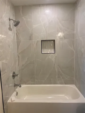 a bathroom with a bathtub