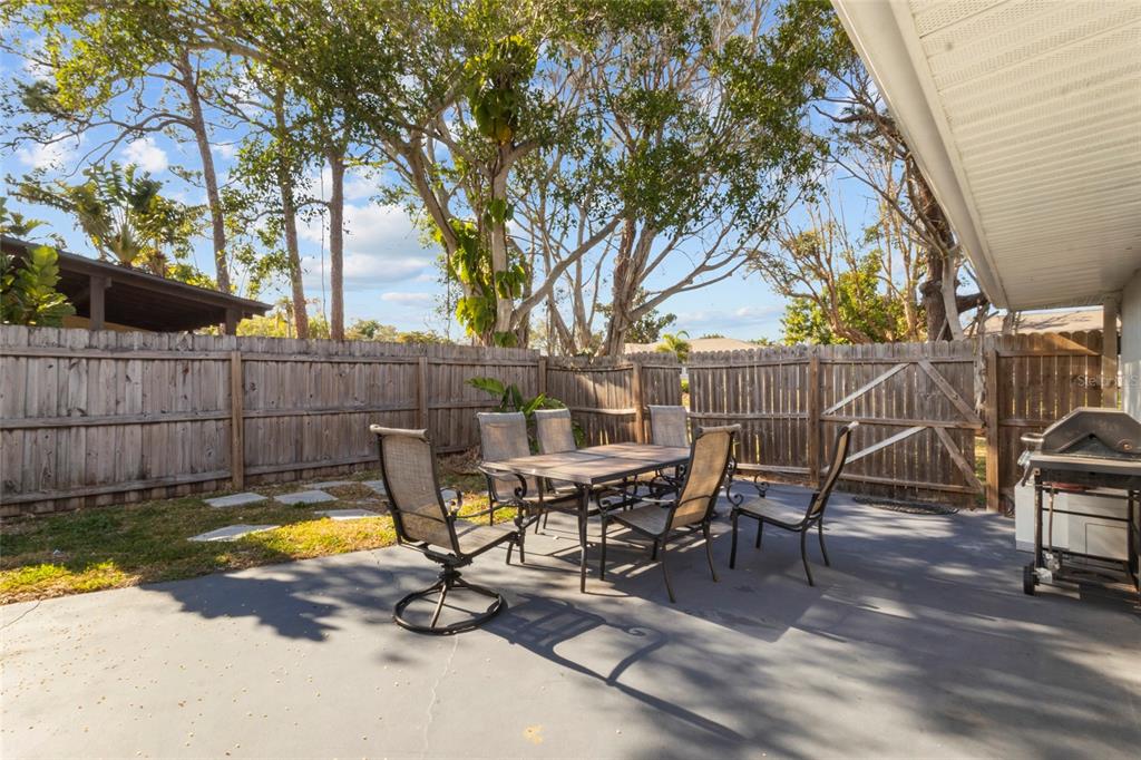 7230 Shepherd Street Sarasota, FL 34243 - Photo 27 of 30 a view of a swimming pool with a patio