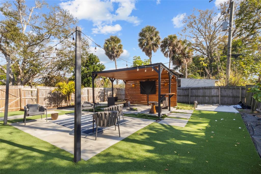 7230 Shepherd Street Sarasota, FL 34243 - Photo 29 of 30 a view of a backyard with sitting area