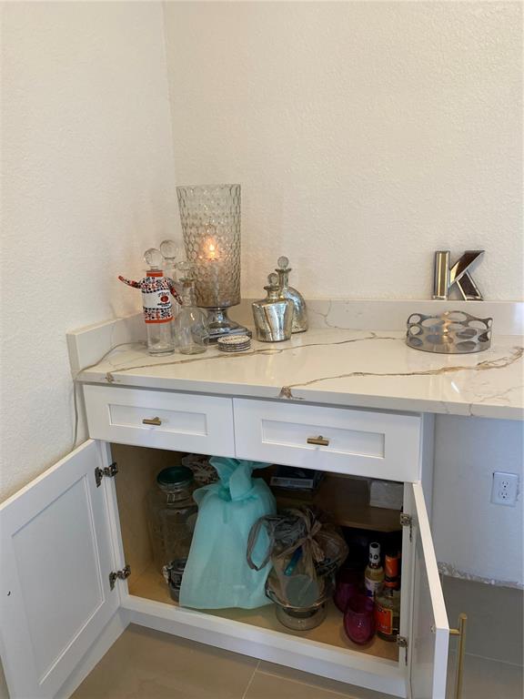 7230 Shepherd Street Sarasota, FL 34243 - Photo 31 of 38 a bathroom with a sink and a mirror