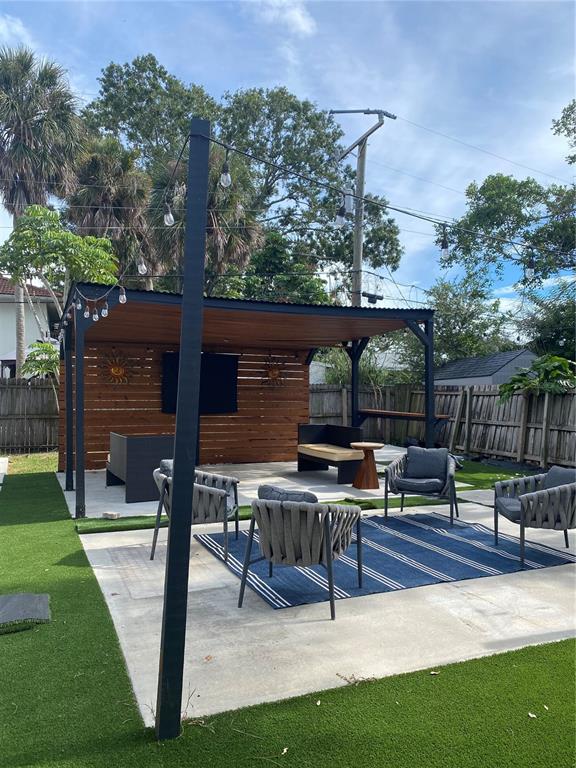 7230 Shepherd Street Sarasota, FL 34243 - Photo 32 of 38 a view of backyard with sitting area