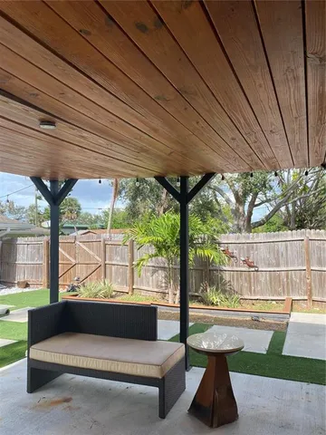 a view of car parked in front of house