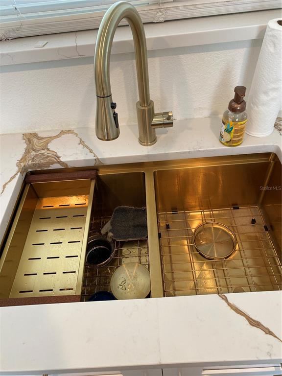 7230 Shepherd Street Sarasota, FL 34243 - Photo 7 of 38 a bathroom with a sink