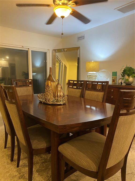 7230 Shepherd Street Sarasota, FL 34243 - Photo 10 of 38 a view of a dining room with furniture