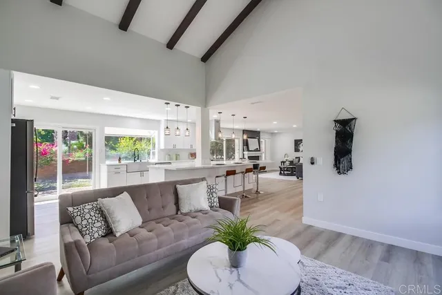 a bathroom with a glass door shower and a toilet