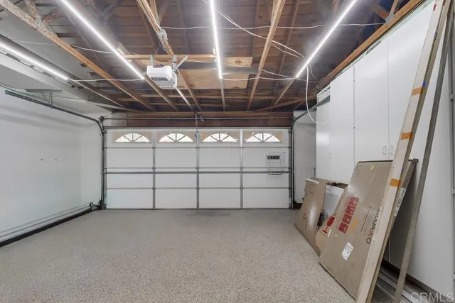 a view of a yard with flower plants