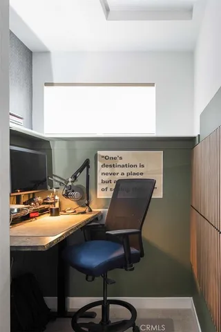 a room with furniture and wooden floor