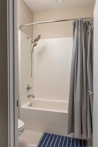 a view of a kitchen with a stove top oven
