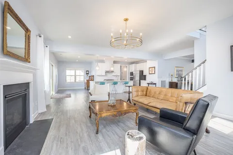 a bathroom with a tub and a shower