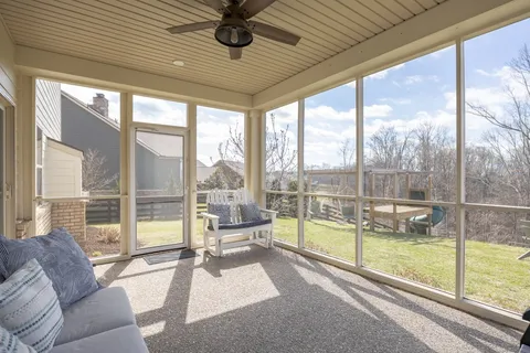 a room with a window and wooden floor