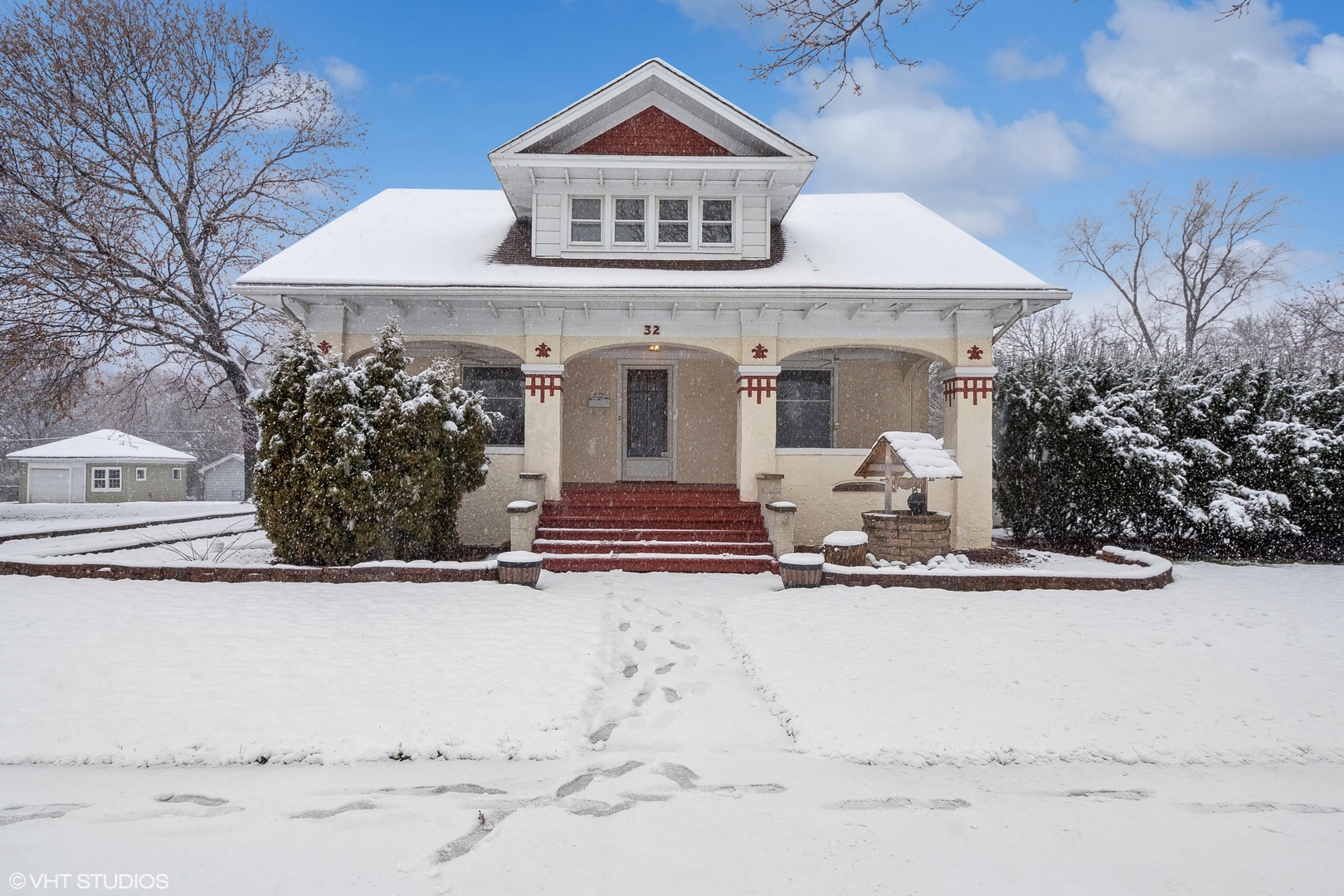32 East Maple Avenue Roselle, IL 60172 - Photo 1 of 19 a view of a house with a snow in the yard