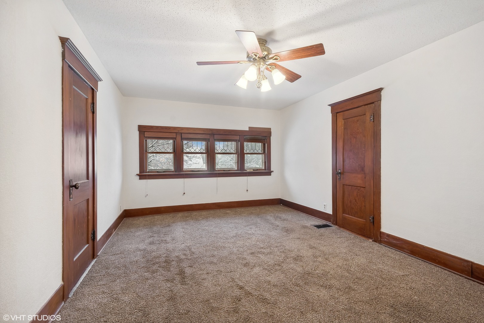 32 East Maple Avenue Roselle, IL 60172 - Photo 11 of 19 a view of an empty room with a window