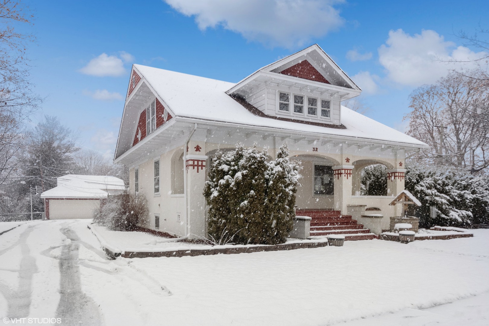 32 East Maple Avenue Roselle, IL 60172 - Photo 2 of 19 a front view of a house with parking and parking