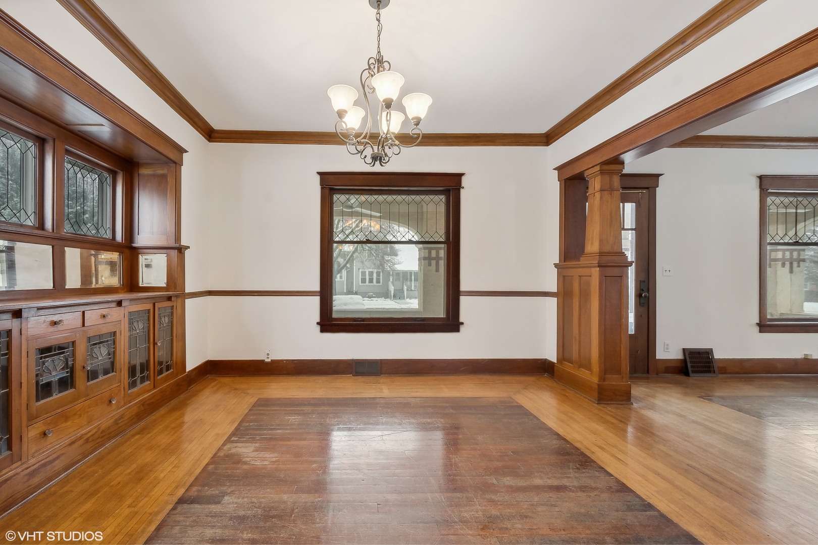 32 East Maple Avenue Roselle, IL 60172 - Photo 8 of 19 a view of a room with wooden floor and large windows