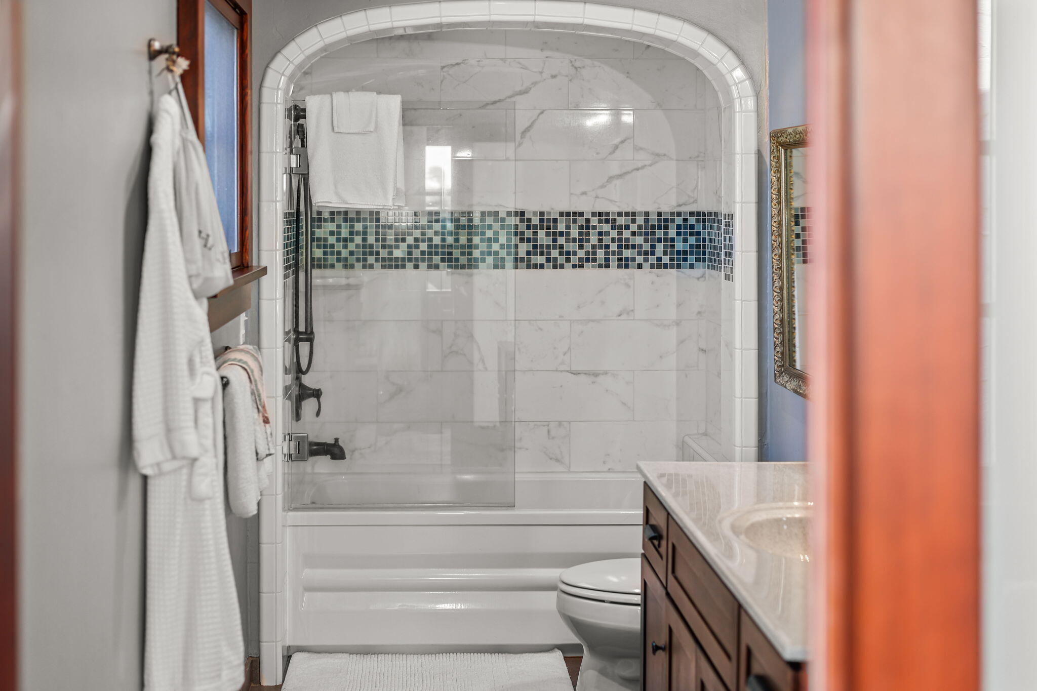 1465 Riverside Drive Redding, CA 96001 - Photo 95 of 163 a bathroom with a granite countertop mirror and a shower