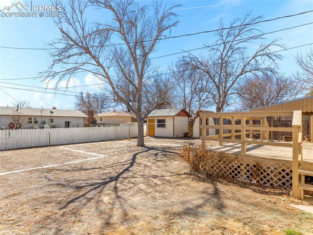65 University Circle Pueblo, CO 81005 - Photo 28 of 32 a street view with large trees