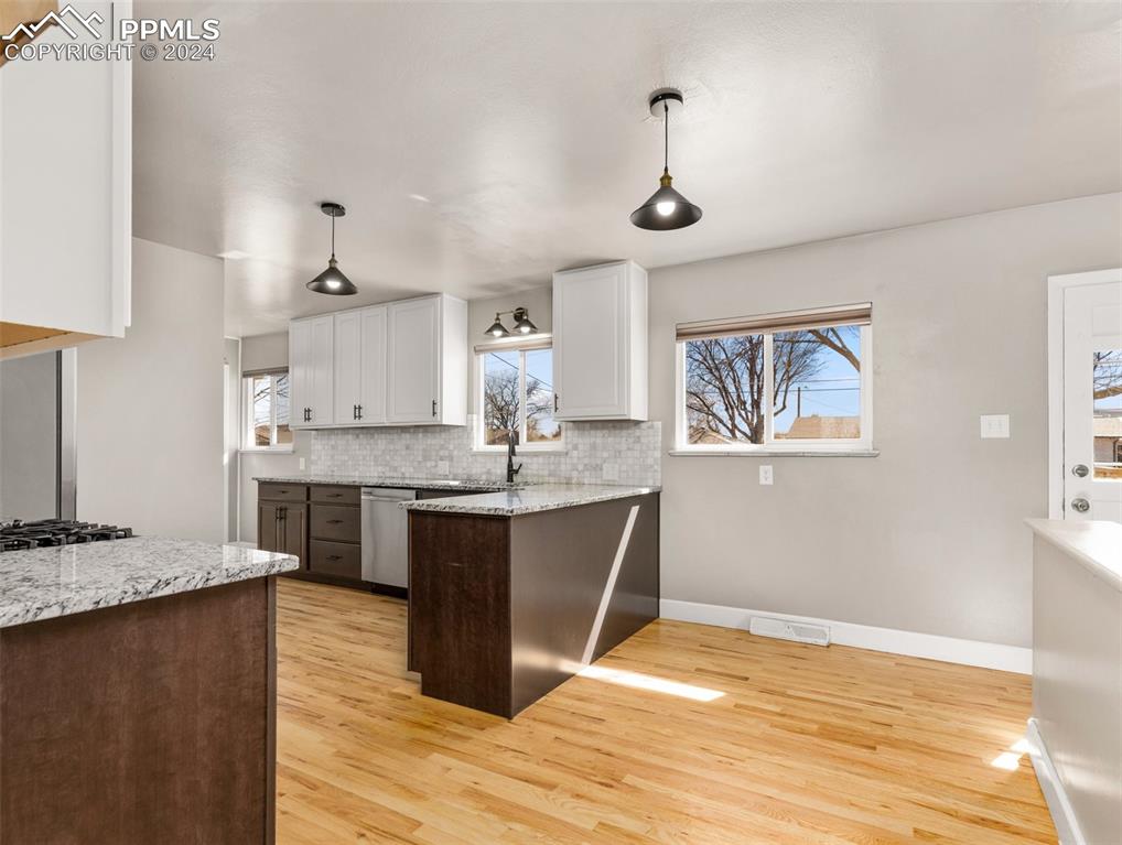 65 University Circle Pueblo, CO 81005 - Photo 3 of 32 a view of kitchen and sink
